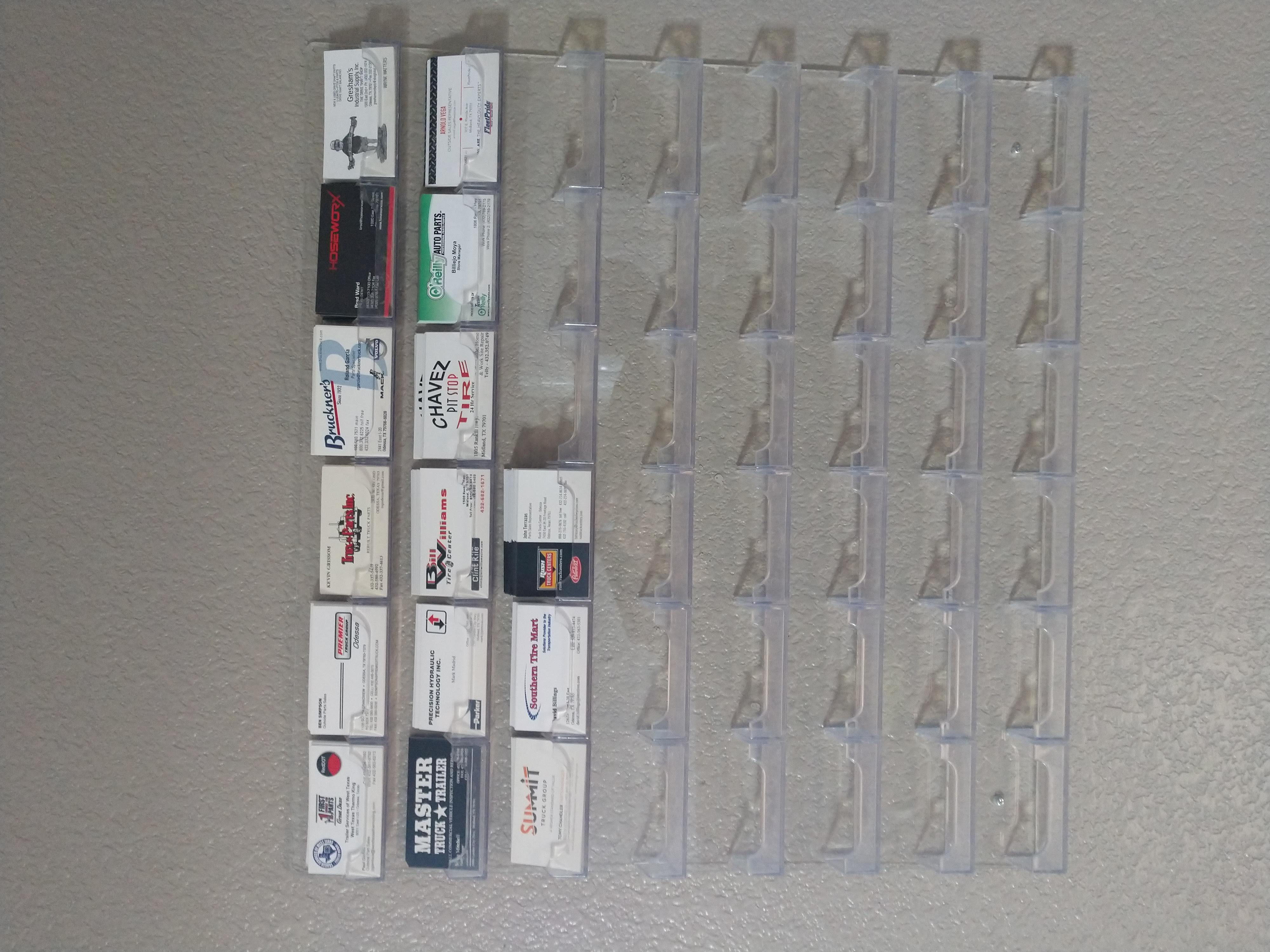 Wall of vetted local service provider business cards